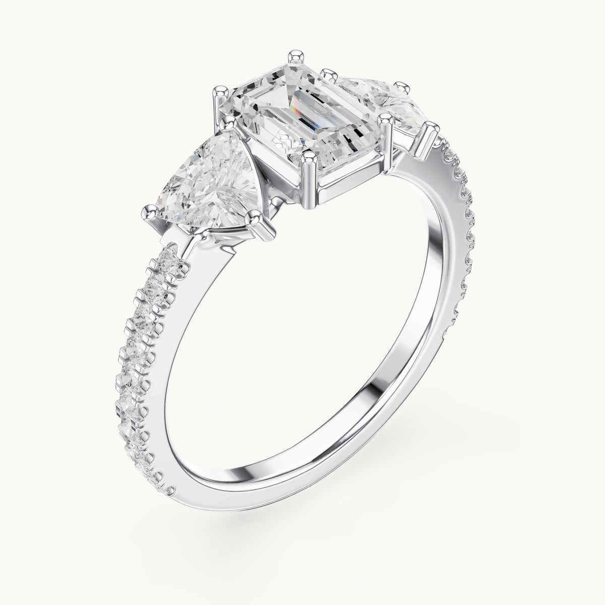 Emerald-cut, trillion and round lab-grown diamond three-stone engagement ring with trillion side stones in white gold, 1.85 CT TW, view 2