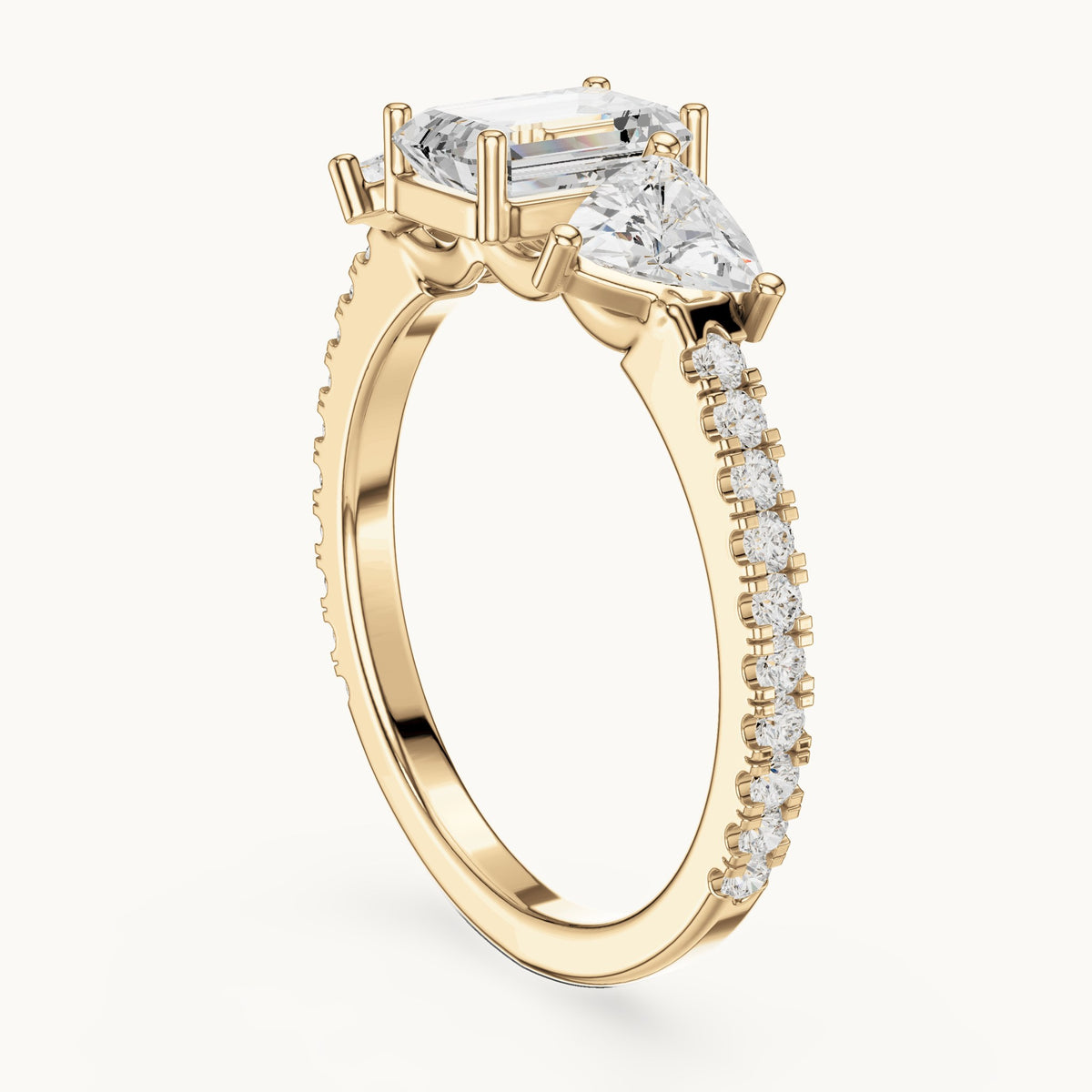 Emerald-cut, trillion and round lab-grown diamond three-stone engagement ring with trillion side stones in yellow gold, 1.85 CT TW, view 1