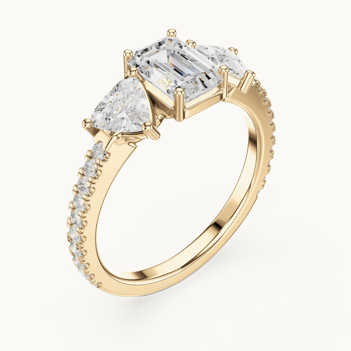 Emerald-cut, trillion and round lab-grown diamond three-stone engagement ring with trillion side stones in yellow gold, 1.85 CT TW, view 2