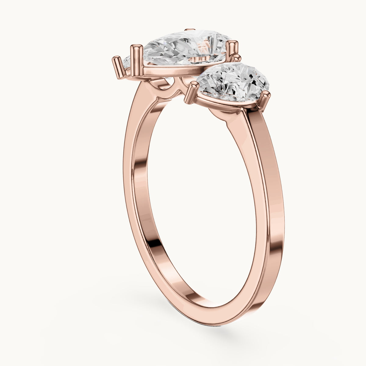 Pear lab-grown diamond three-stone engagement ring with pear side stones in rose gold, 1.82 CT TW, view 1