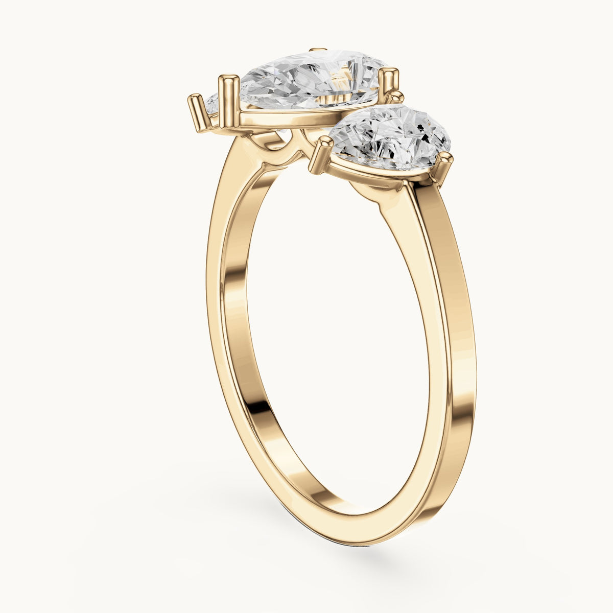 Pear lab-grown diamond three-stone engagement ring with pear side stones in yellow gold, 1.82 CT TW, view 1
