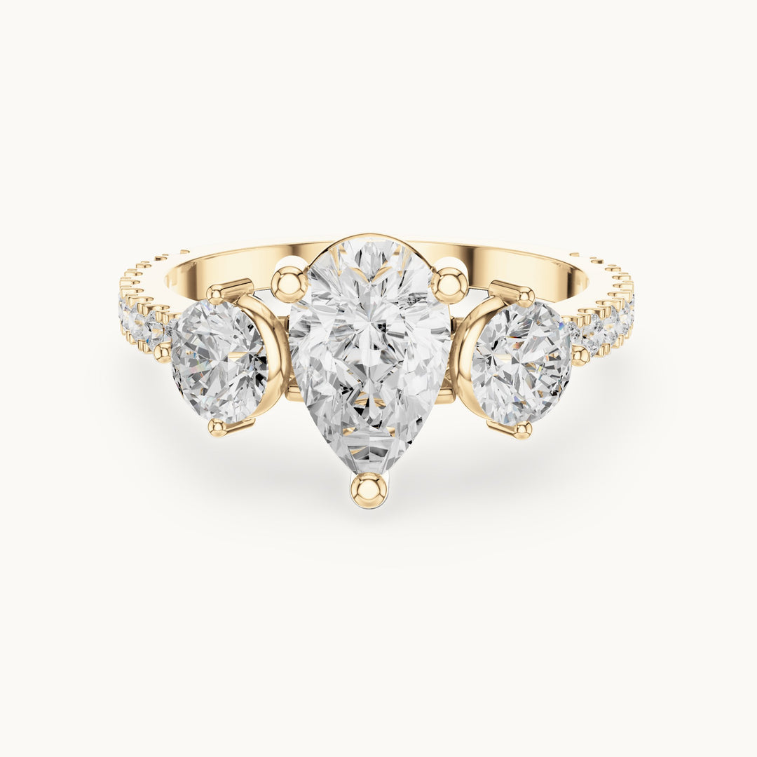 Round and pear lab-grown diamond three-stone pavé engagement ring in yellow gold, 2.024 CT TW, view 4