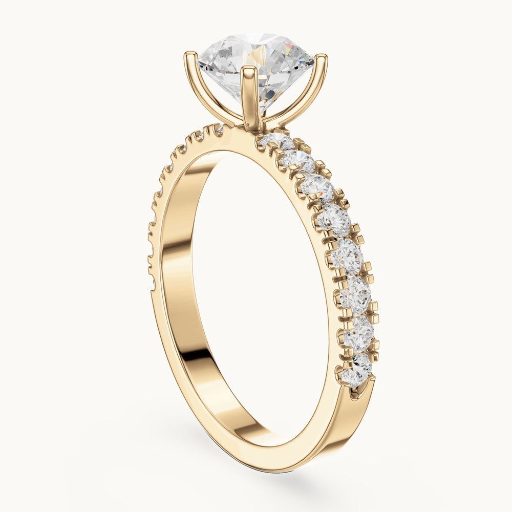 Round lab-grown diamond classic solitaire engagement ring with pavé band in yellow gold, 1.43 CT TW, view 1
