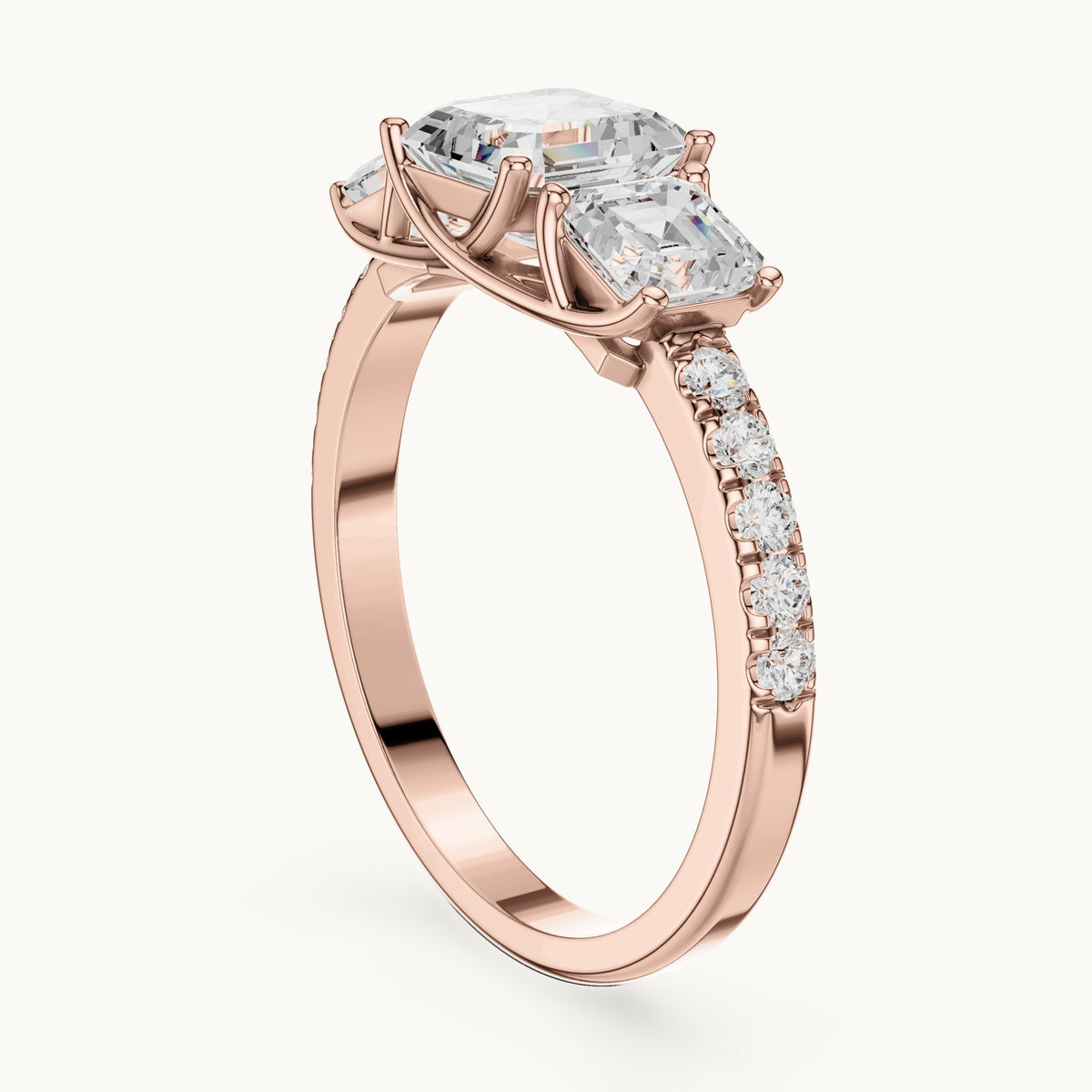 Square emerald-cut and round lab-grown diamond three-stone pavé engagement ring in rose gold, 2.19 CT TW, view 1