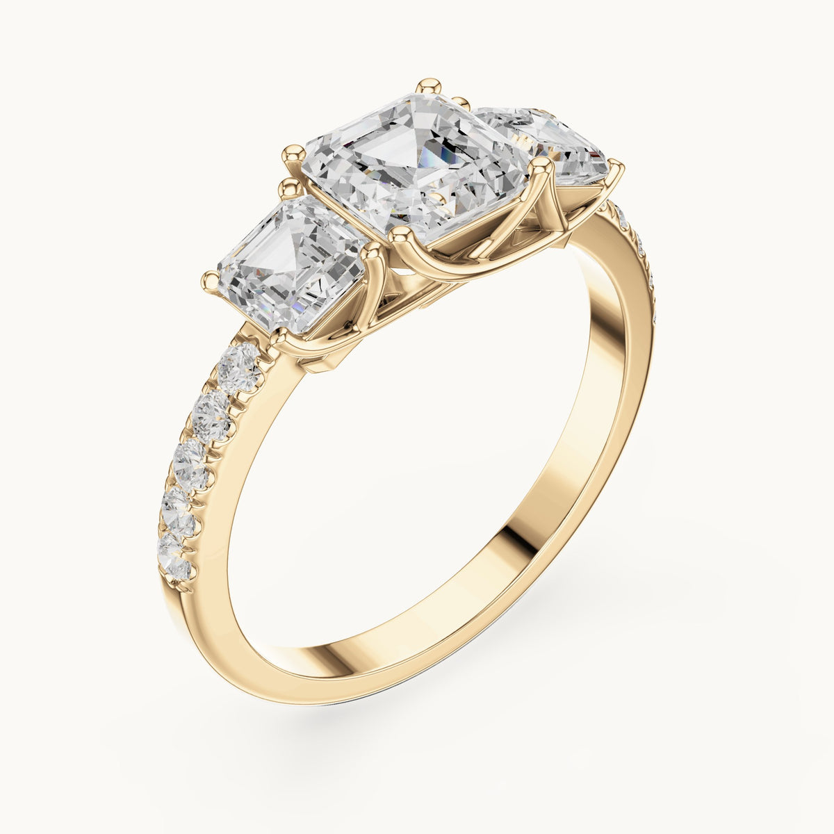 Square emerald-cut and round lab-grown diamond three-stone pavé engagement ring in yellow gold, 2.19 CT TW, view 2