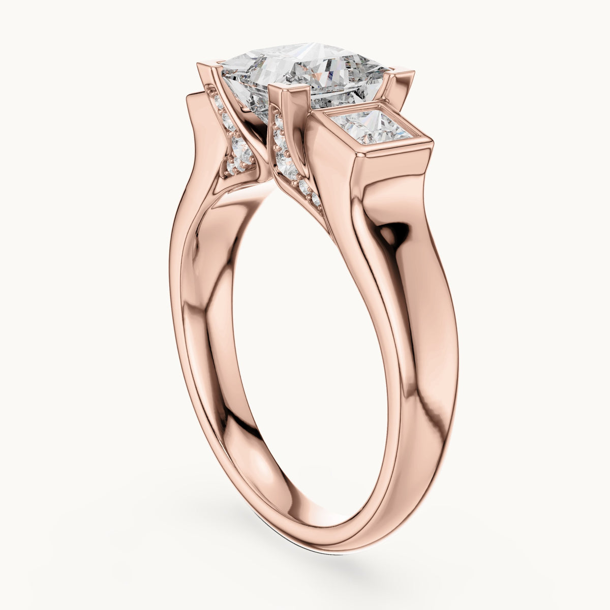 Princess-cut and round lab-grown diamond three-stone engagement ring with bezel side stones in rose gold, 2.136 CT TW, view 1