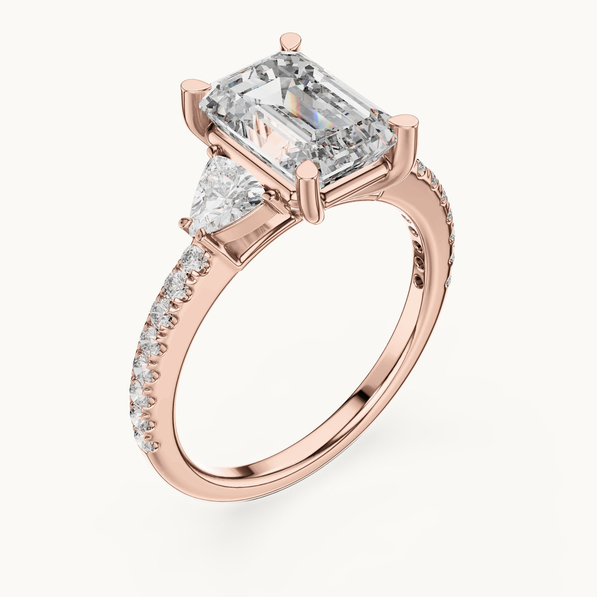 Emerald-cut, trillion and round lab-grown diamond three-stone engagement ring with trillion side stones in rose gold, 3.25 CT TW, view 2