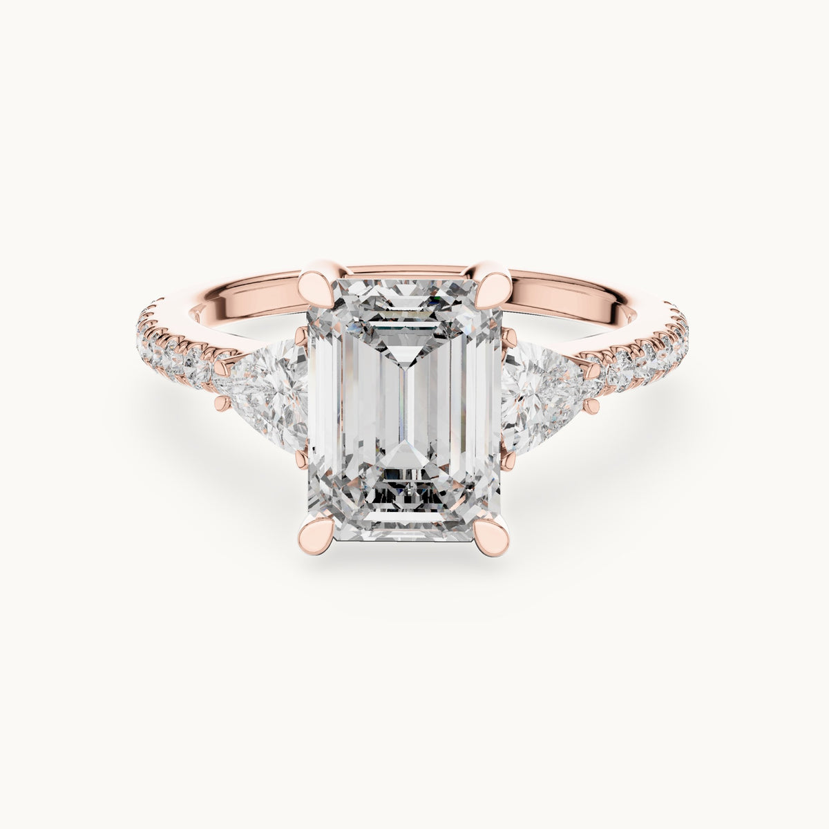 Emerald-cut, trillion and round lab-grown diamond three-stone engagement ring with trillion side stones in rose gold, 3.25 CT TW, view 4