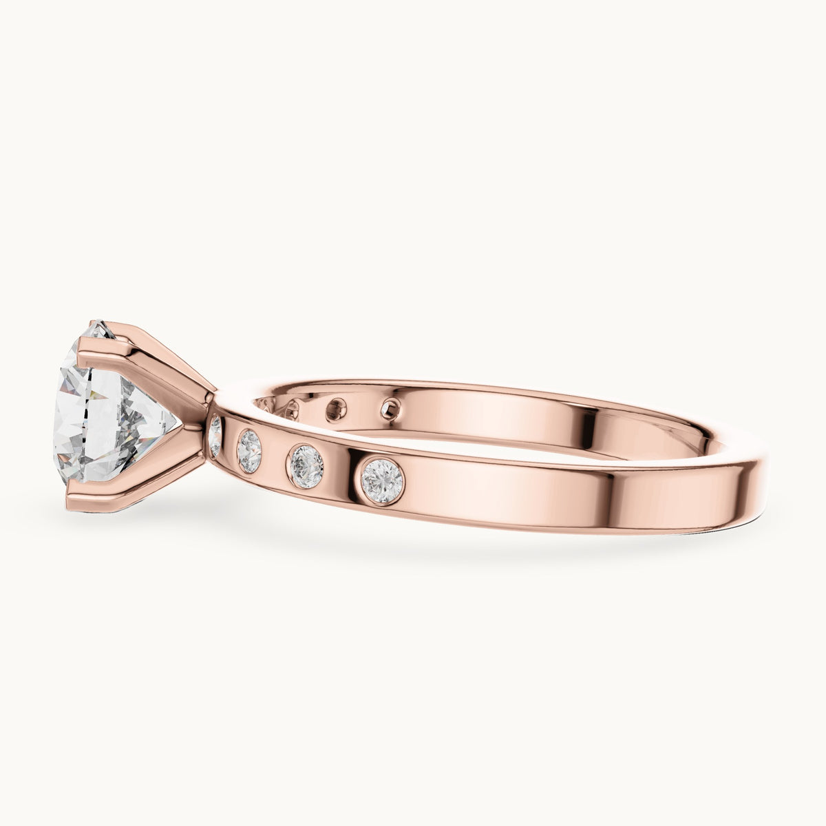 Round lab-grown diamond solitaire engagement ring with bezel accents in rose gold, 1.12 CT TW, view 3