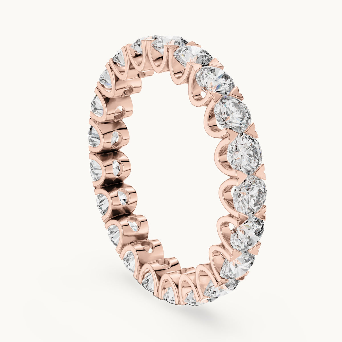 Round lab-grown diamond shared-prong full eternity band in rose gold, 2.73 CT TW, view 1