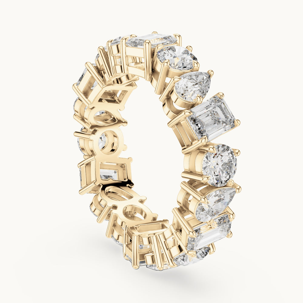 Emerald-cut, round and pear lab-grown diamond mixed-shape full eternity band in yellow gold, 5.76 CT TW, view 1