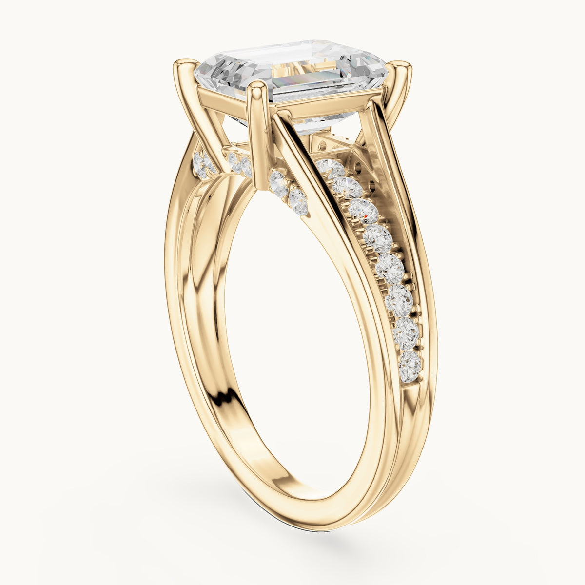 Emerald-cut and round lab-grown diamond split shank channel-set engagement ring in yellow gold, 2.334 CT TW, view 1