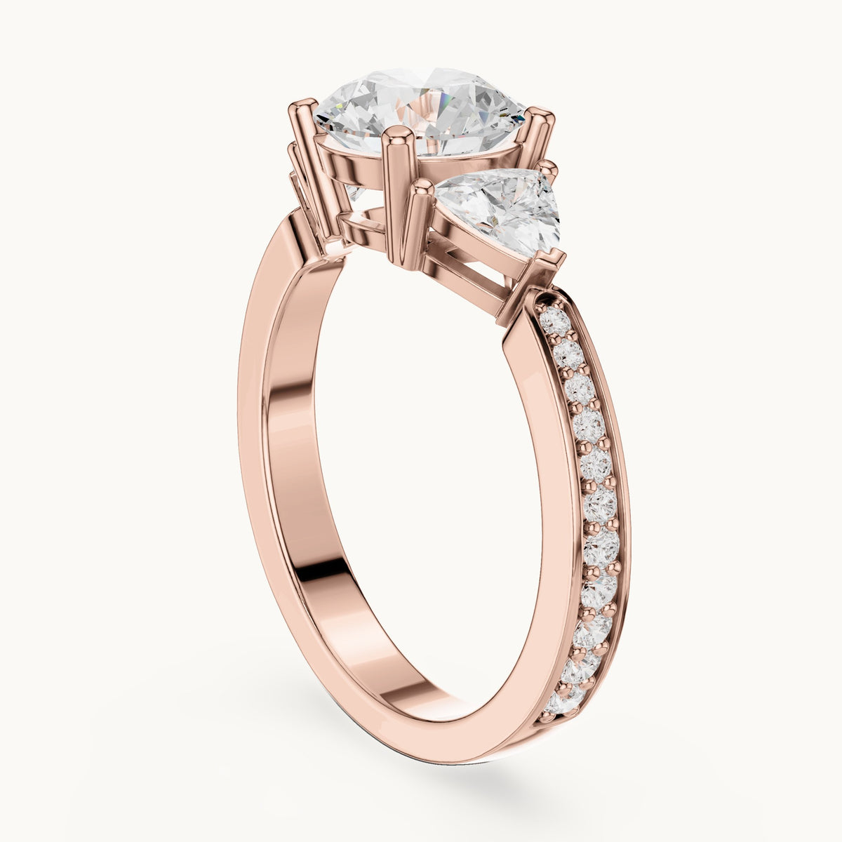 Round and trillion lab-grown diamond three-stone engagement ring with trillion side stones in rose gold, 2.188 CT TW, view 1