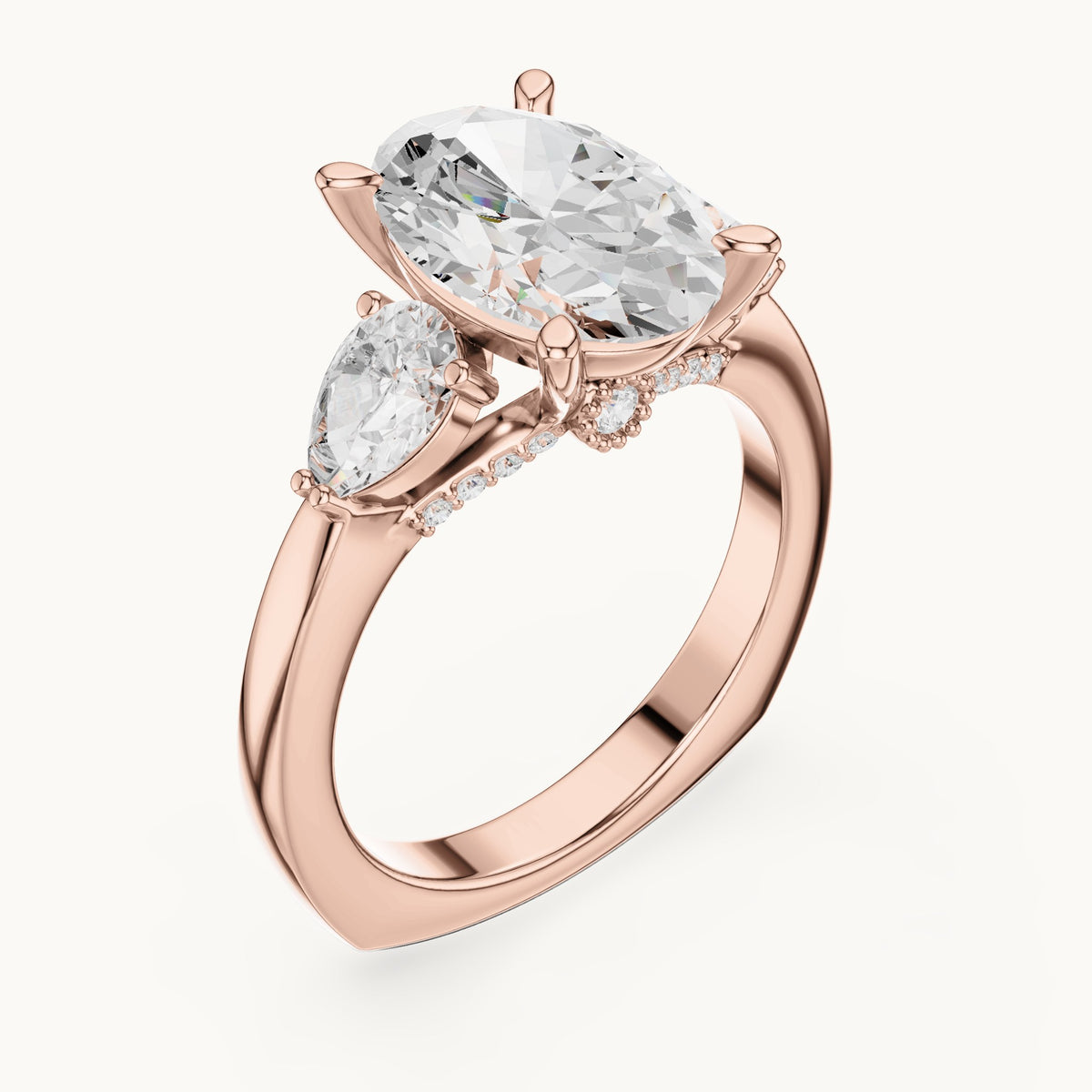 Oval, pear and round lab-grown diamond three-stone engagement ring with pear side stones in rose gold, 3.716 CT TW, view 2