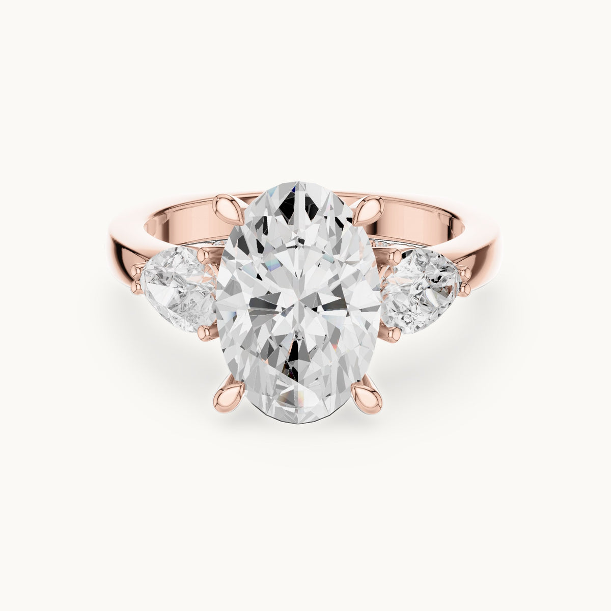 Oval, pear and round lab-grown diamond three-stone engagement ring with pear side stones in rose gold, 3.716 CT TW, view 4