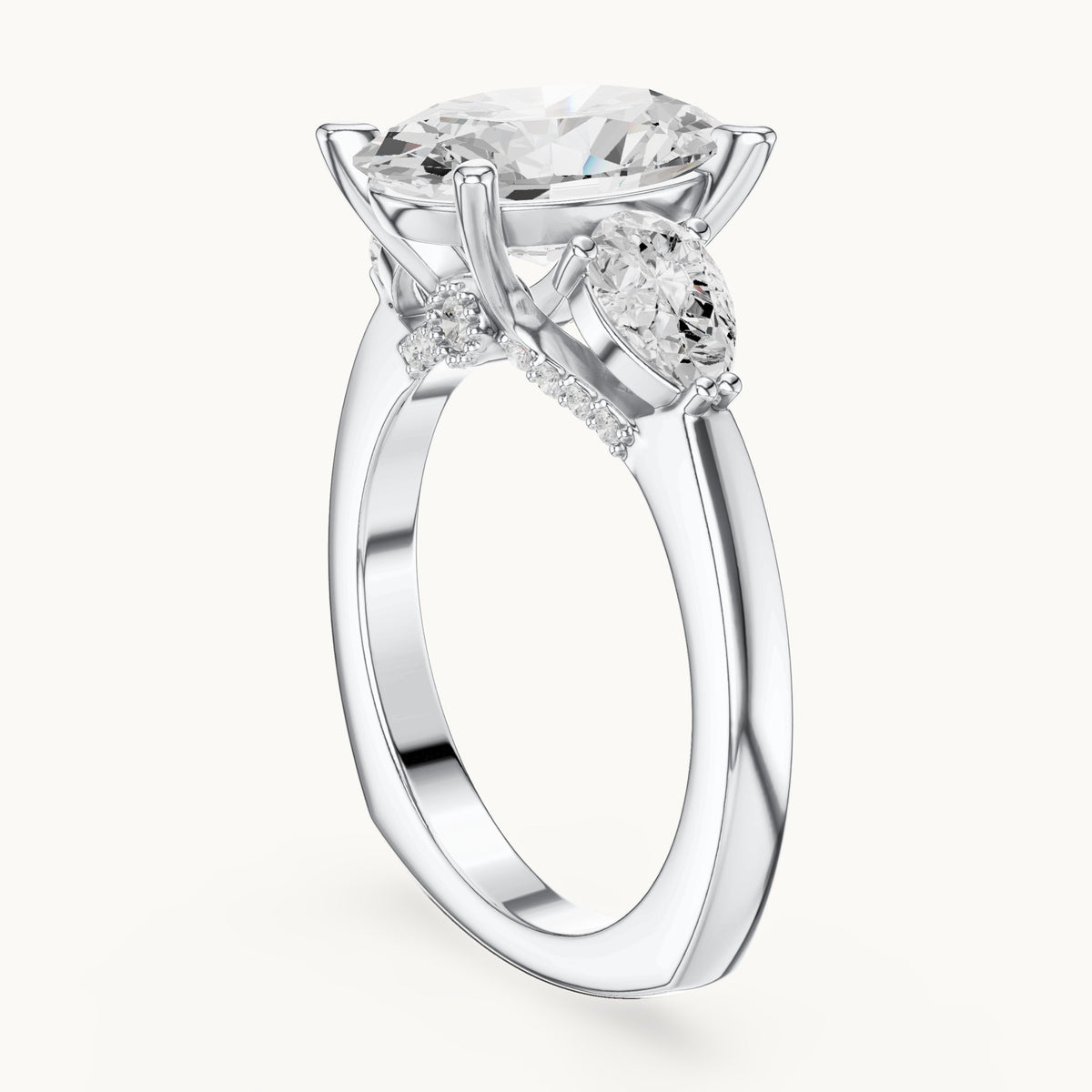 Oval, pear and round lab-grown diamond three-stone engagement ring with pear side stones in white gold, 3.716 CT TW, view 1