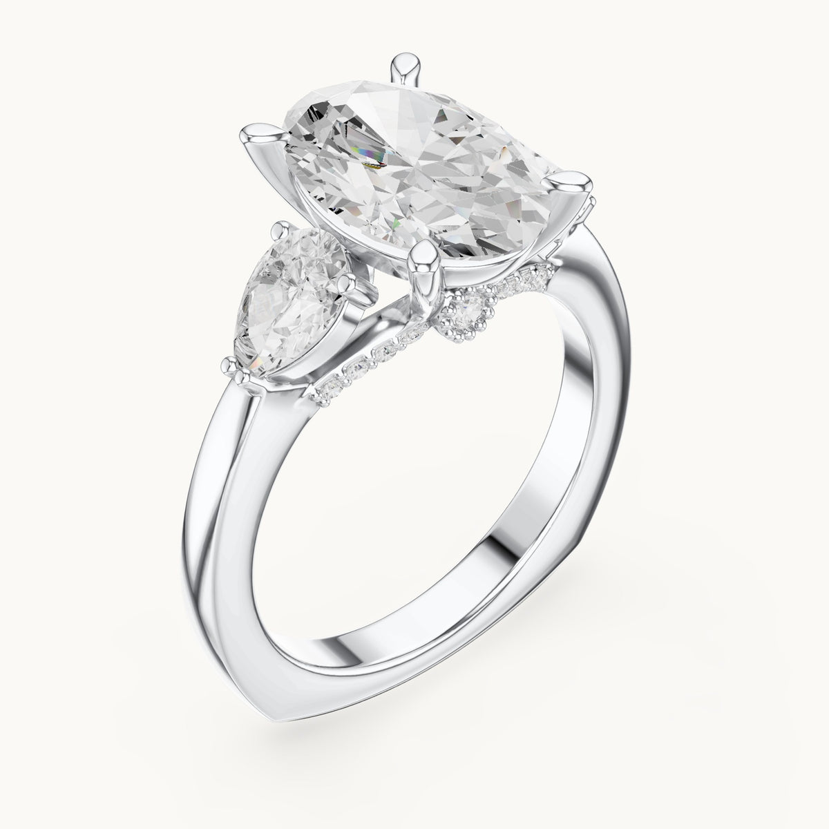 Oval, pear and round lab-grown diamond three-stone engagement ring with pear side stones in white gold, 3.716 CT TW, view 2