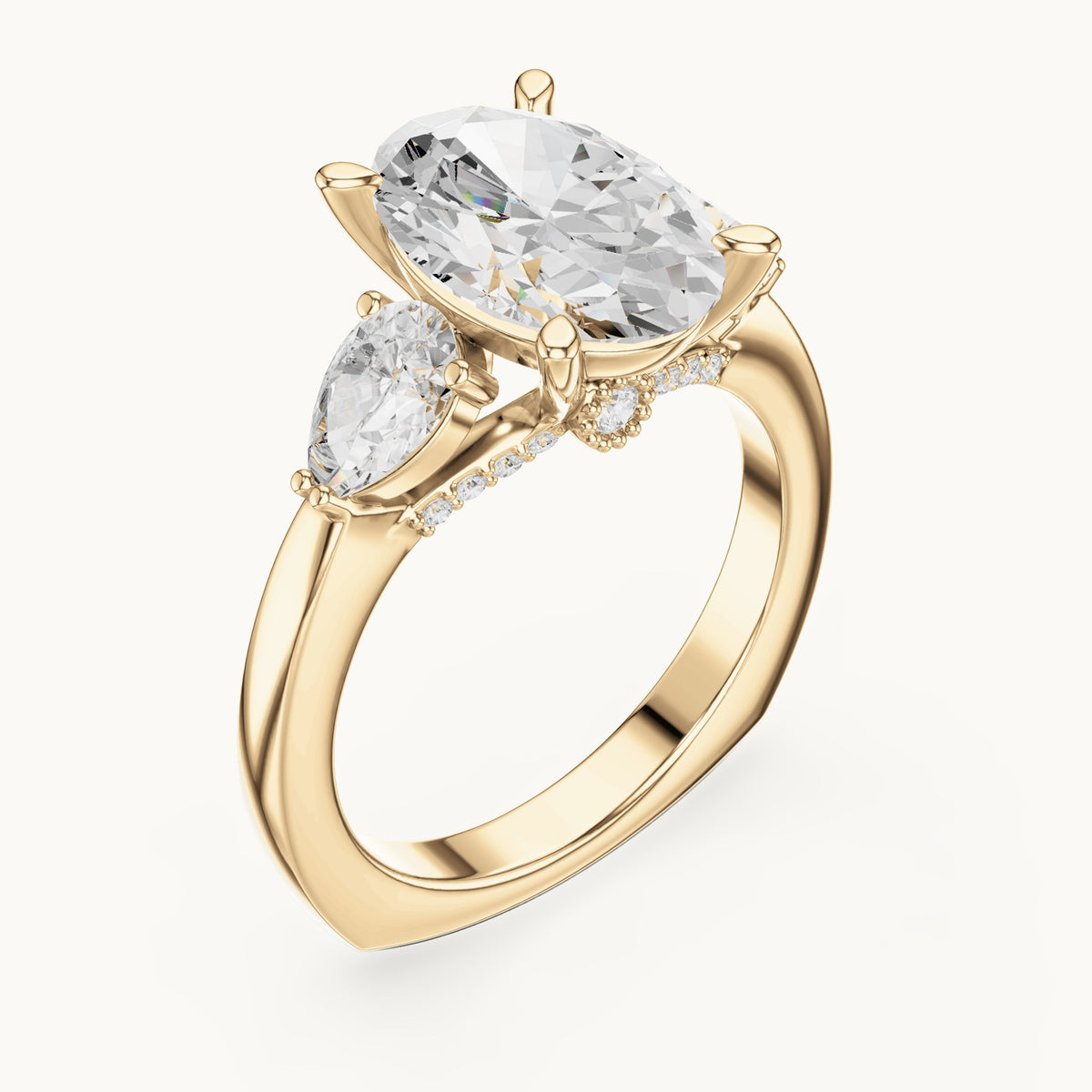 Oval, pear and round lab-grown diamond three-stone engagement ring with pear side stones in yellow gold, 3.716 CT TW, view 2