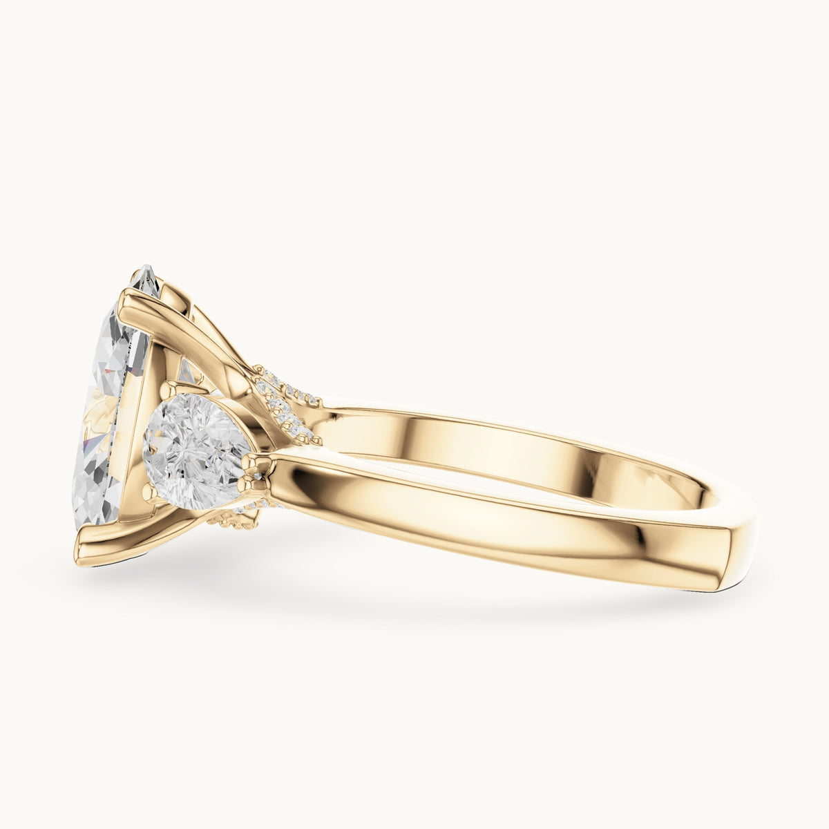 Oval, pear and round lab-grown diamond three-stone engagement ring with pear side stones in yellow gold, 3.716 CT TW, view 3