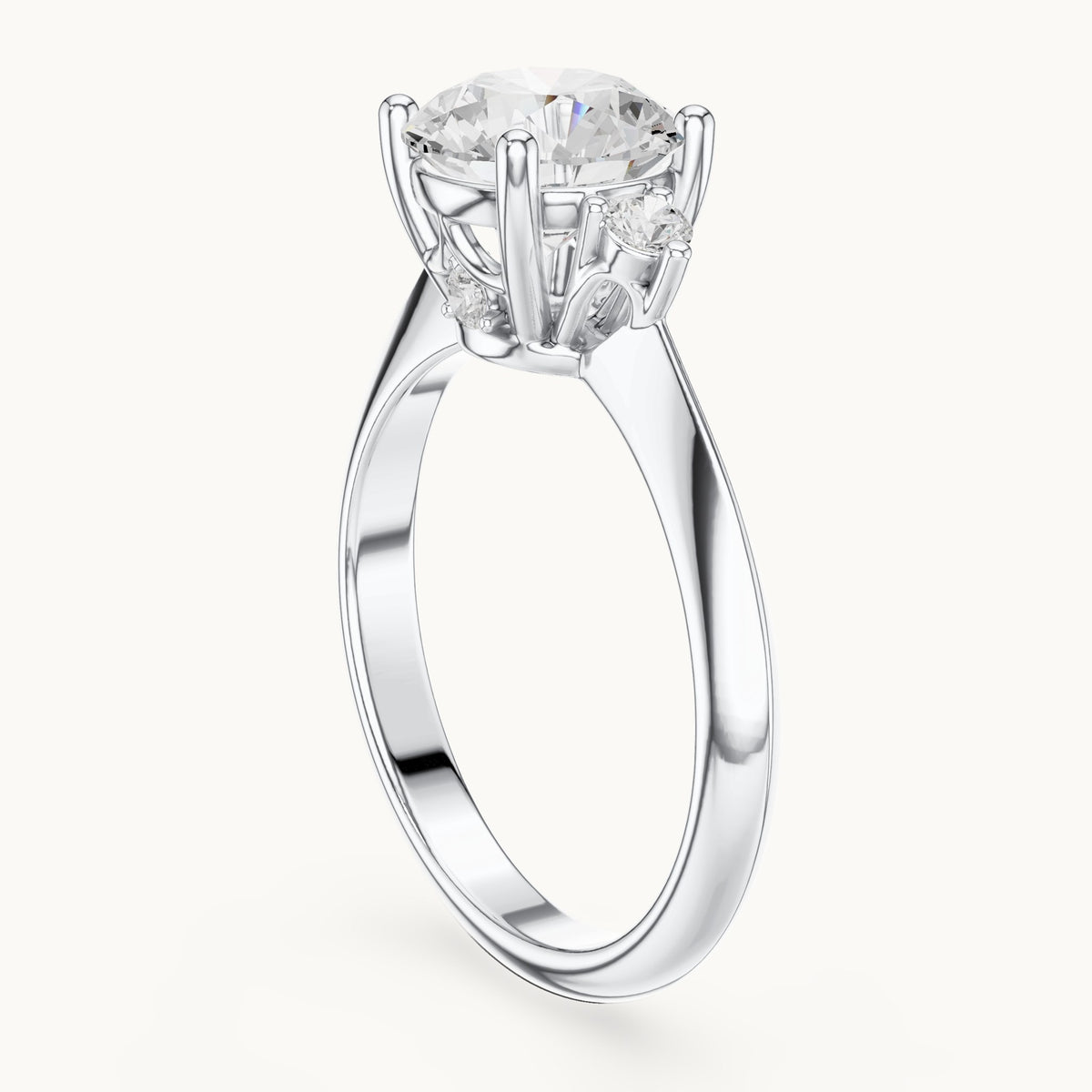 Round lab-grown diamond three-stone engagement ring with hidden accents in white gold, 2.16 CT TW, view 1