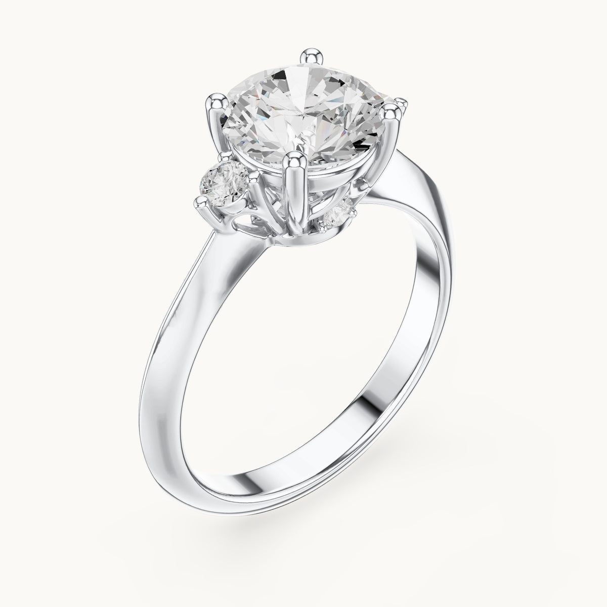 Round lab-grown diamond three-stone engagement ring with hidden accents in white gold, 2.16 CT TW, view 2