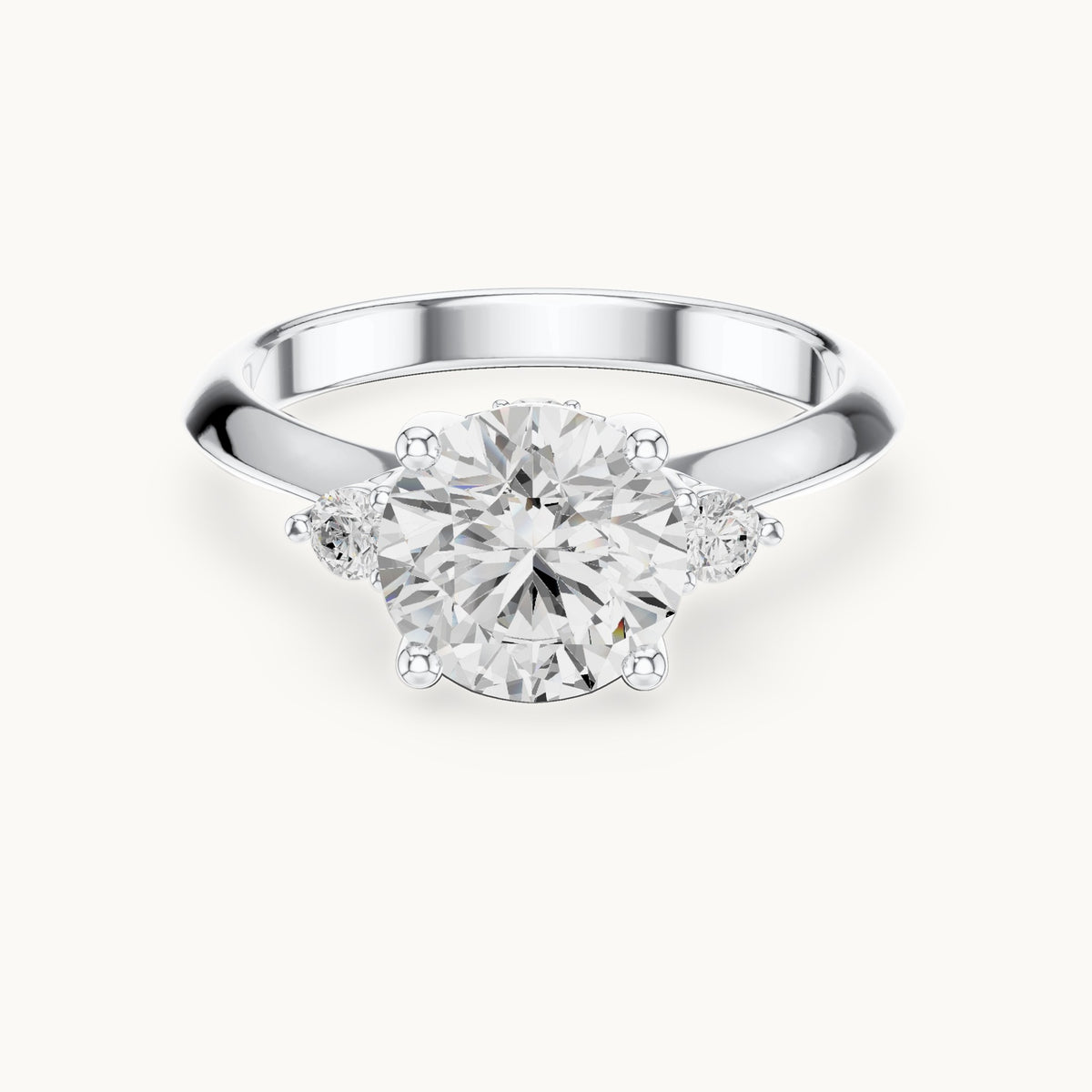 Round lab-grown diamond three-stone engagement ring with hidden accents in white gold, 2.16 CT TW, view 4