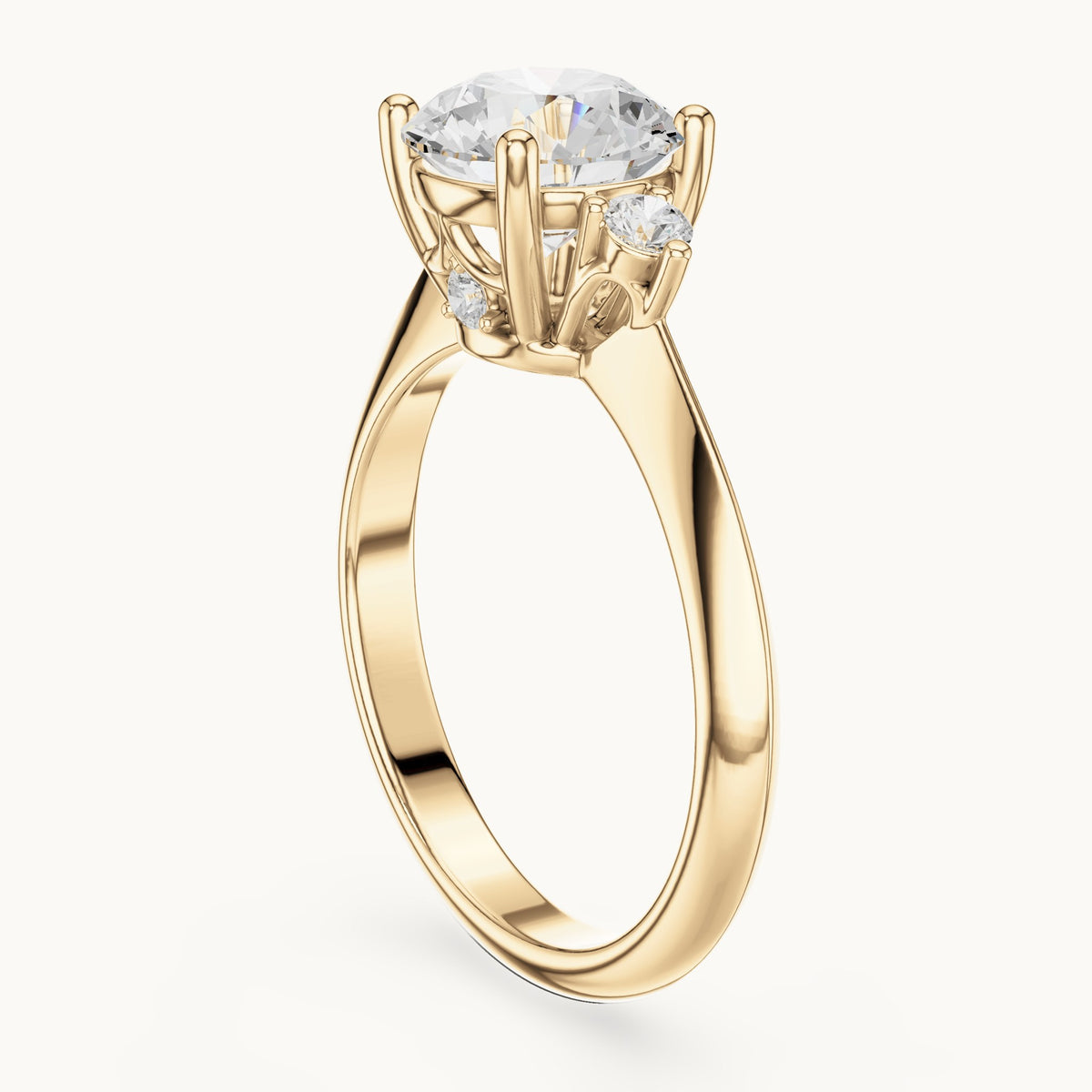 Round lab-grown diamond three-stone engagement ring with hidden accents in yellow gold, 2.16 CT TW, view 1
