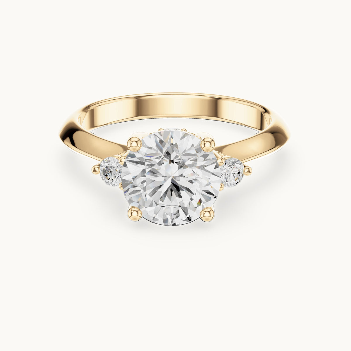 Round lab-grown diamond three-stone engagement ring with hidden accents in yellow gold, 2.16 CT TW, view 4