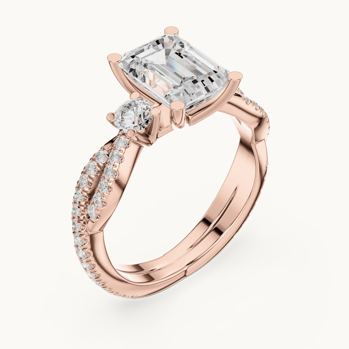 Emerald-cut and round lab-grown diamond twisted pavé engagement ring with side stones in rose gold, 2.778 CT TW, view 2
