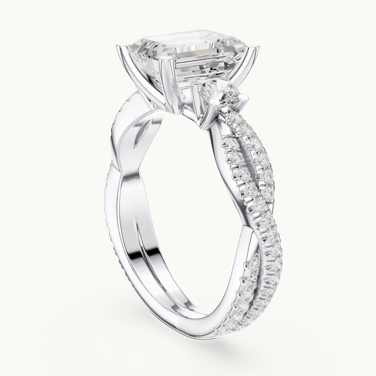 Emerald-cut and round lab-grown diamond twisted pavé engagement ring with side stones in white gold, 2.778 CT TW, view 1