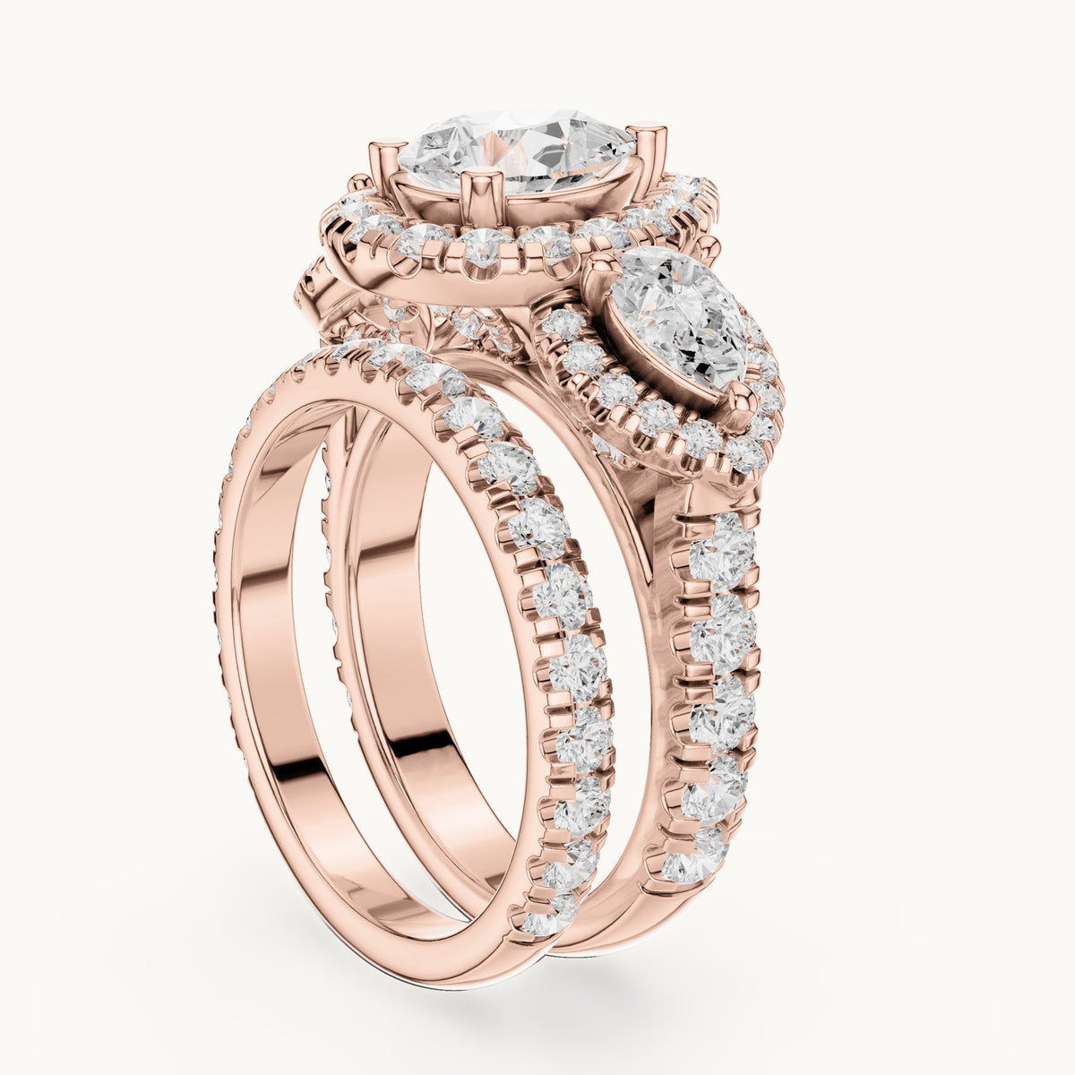 Pear and round lab-grown diamond halo three-stone double band engagement ring in rose gold, 4.323 CT TW, view 1
