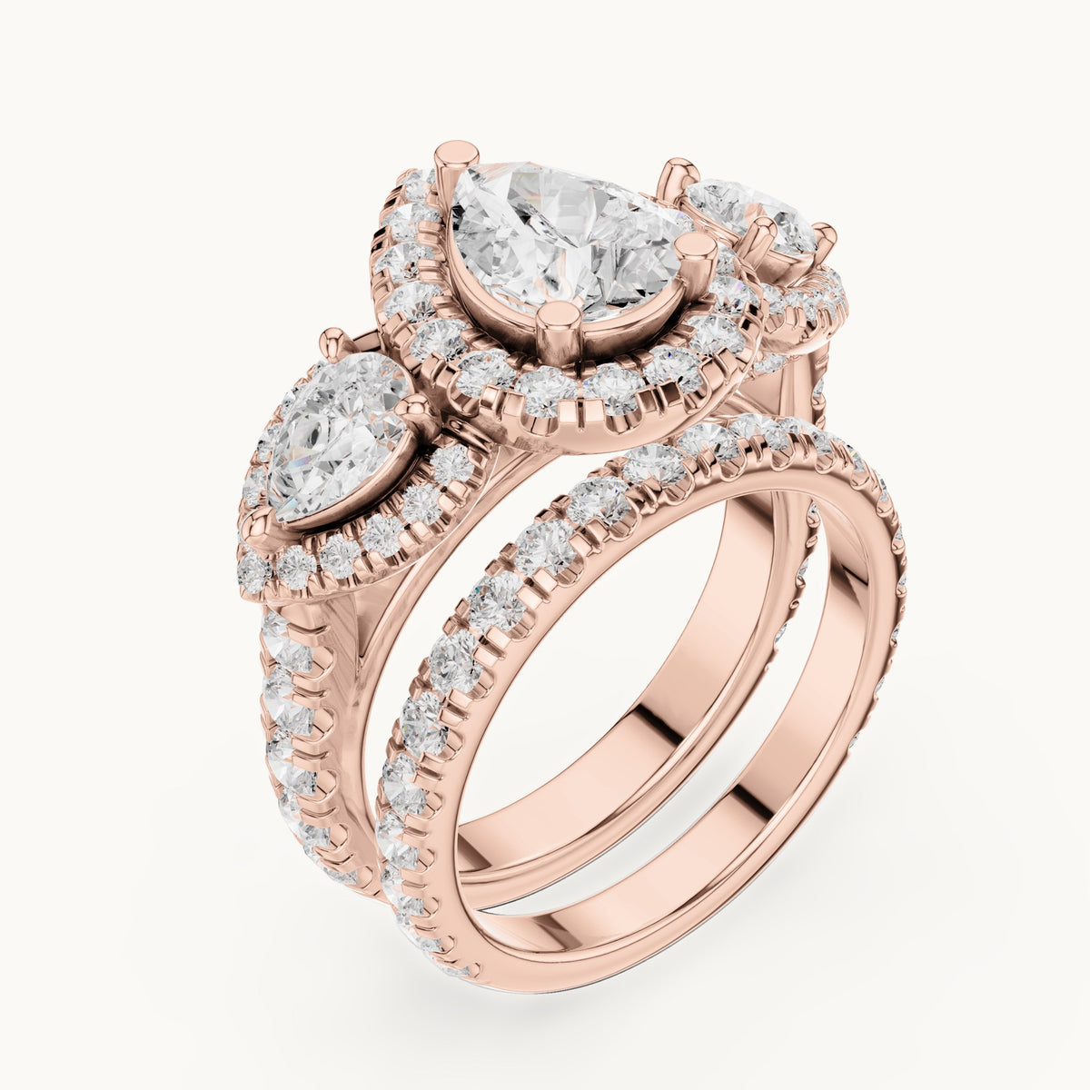 Pear and round lab-grown diamond halo three-stone double band engagement ring in rose gold, 4.323 CT TW, view 2