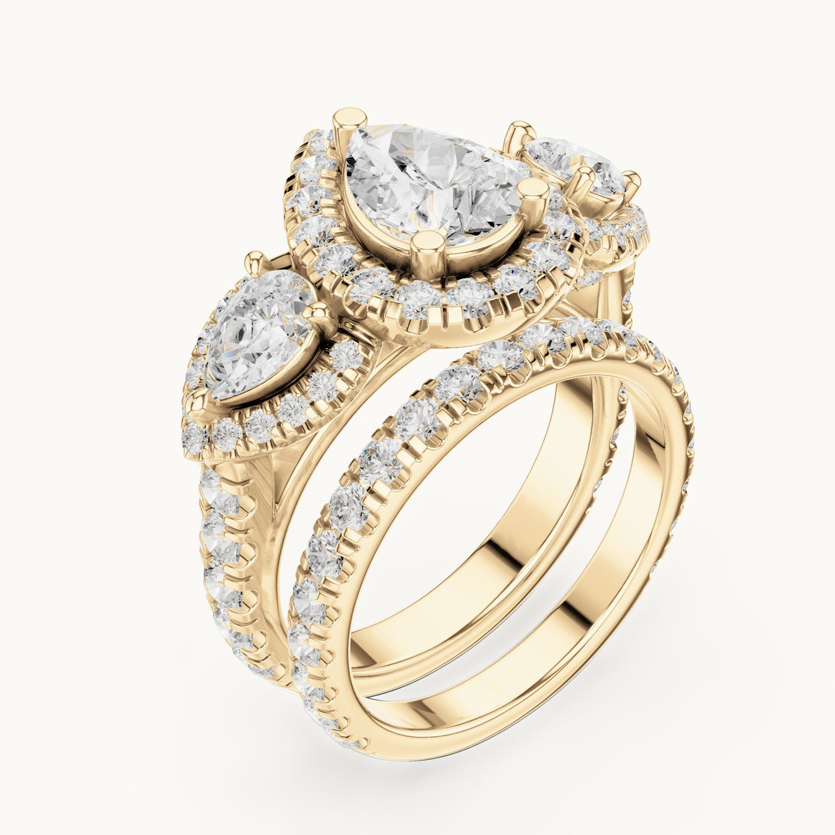 Pear and round lab-grown diamond halo three-stone double band engagement ring in yellow gold, 4.323 CT TW, view 2