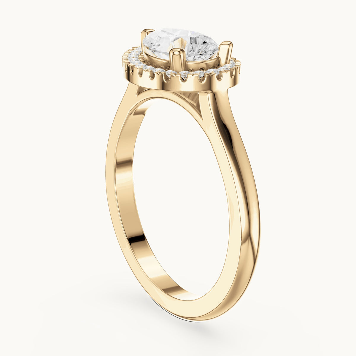 Pear and round lab-grown diamond tilted halo engagement ring in yellow gold, 1.071 CT TW, view 1