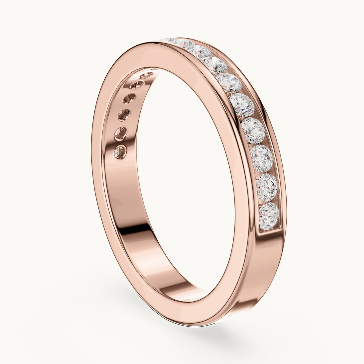 Round lab-grown diamond channel set band in 14K rose gold, 0.51 CT TW, view 1