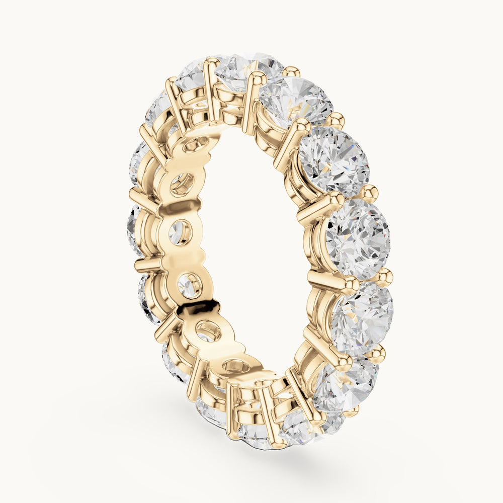 Round lab-grown diamond statement shared-prong full eternity band in yellow gold, 6.45 CT TW, view 1