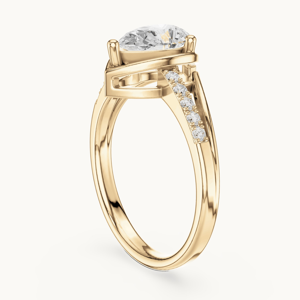 Pear lab-grown diamond bypass engagement ring in 14K yellow gold, 0.90 CT TW, view 1