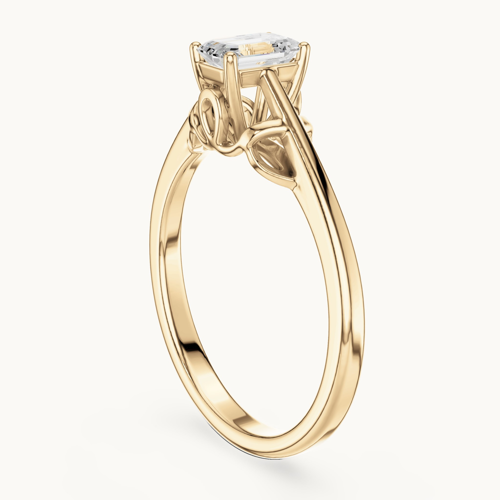 Emerald-cut lab-grown diamond solitaire engagement ring in 14K yellow gold, 0.43 CT TW, view 1