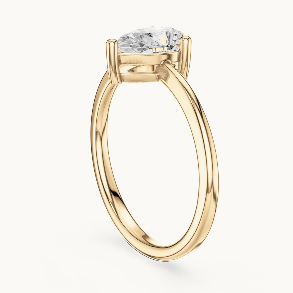 Pear lab-grown diamond solitaire engagement ring in 14K yellow gold, 0.90 CT TW, view 1