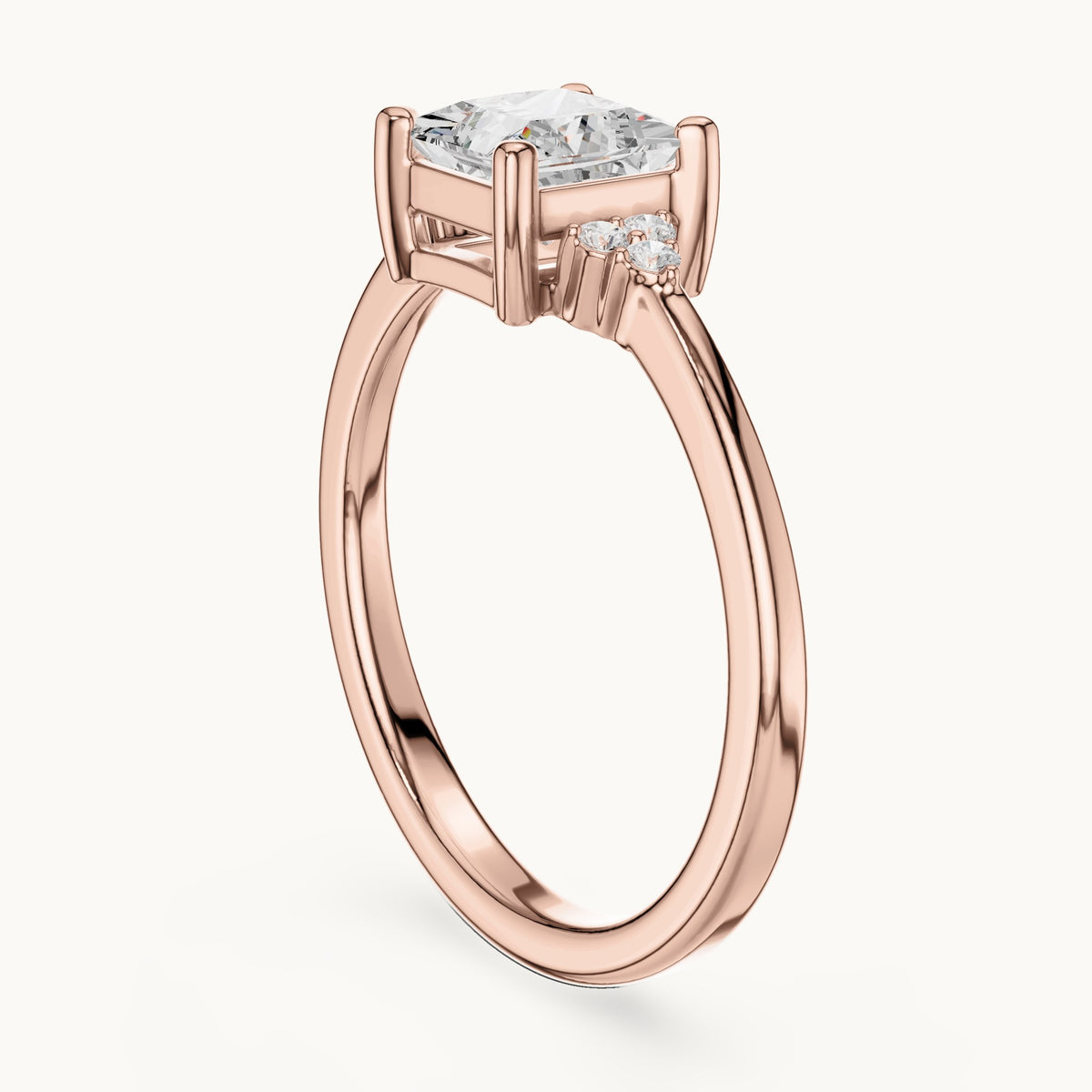 Princess-cut and round lab-grown diamond engagement ring with side clusters in rose gold, 0.92 CT TW, view 1