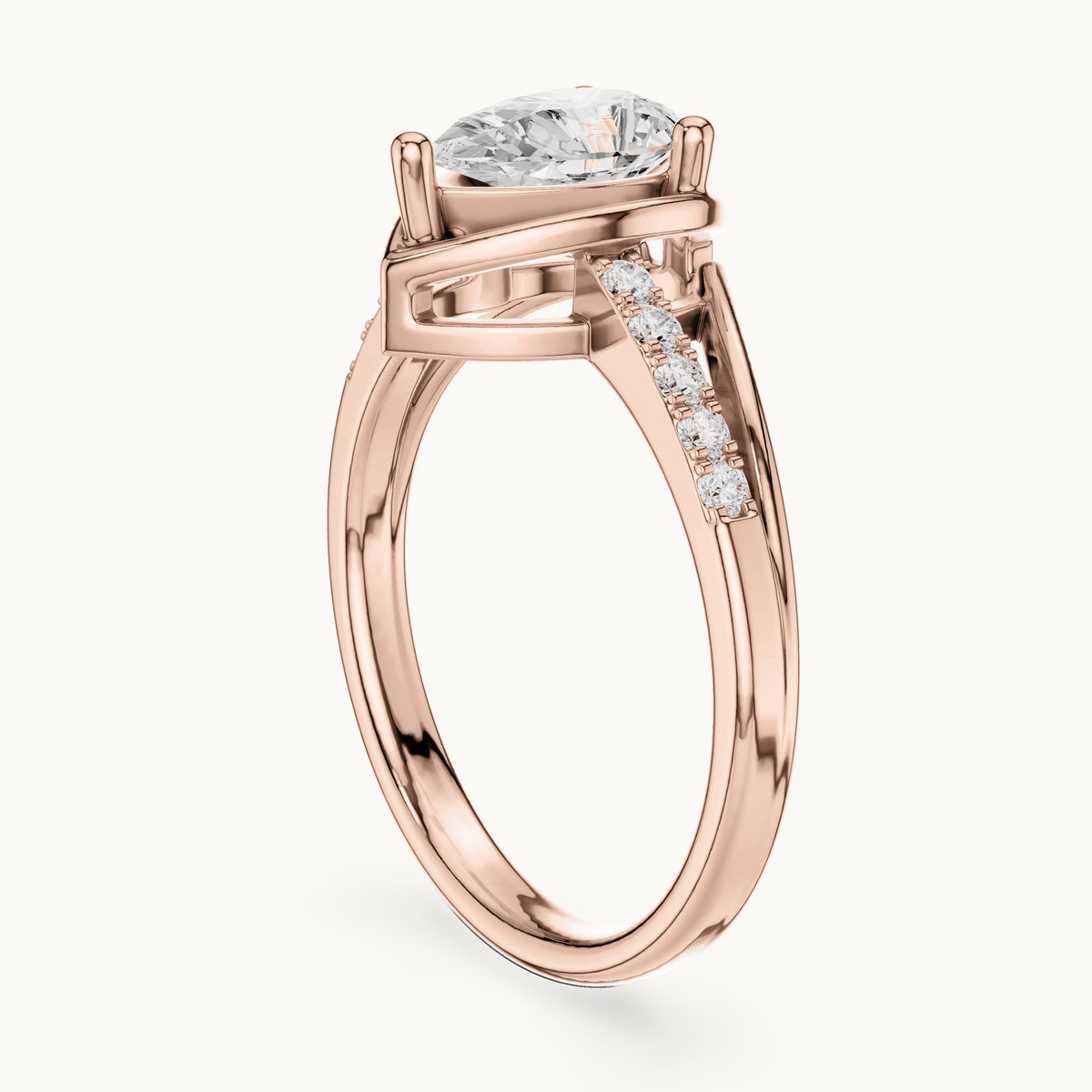 Pear lab-grown diamond bezel-set engagement ring with pavé band in rose gold, 0.90 CT TW, view 1