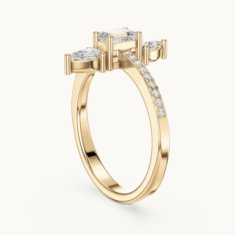 Emerald-cut and pear lab-grown diamond north-south three-stone ring in yellow gold, 0.69 CT TW, view 1