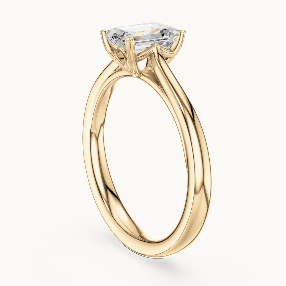 Emerald-cut lab-grown diamond solitaire engagement ring in yellow gold, 0.97 CT TW, view 1