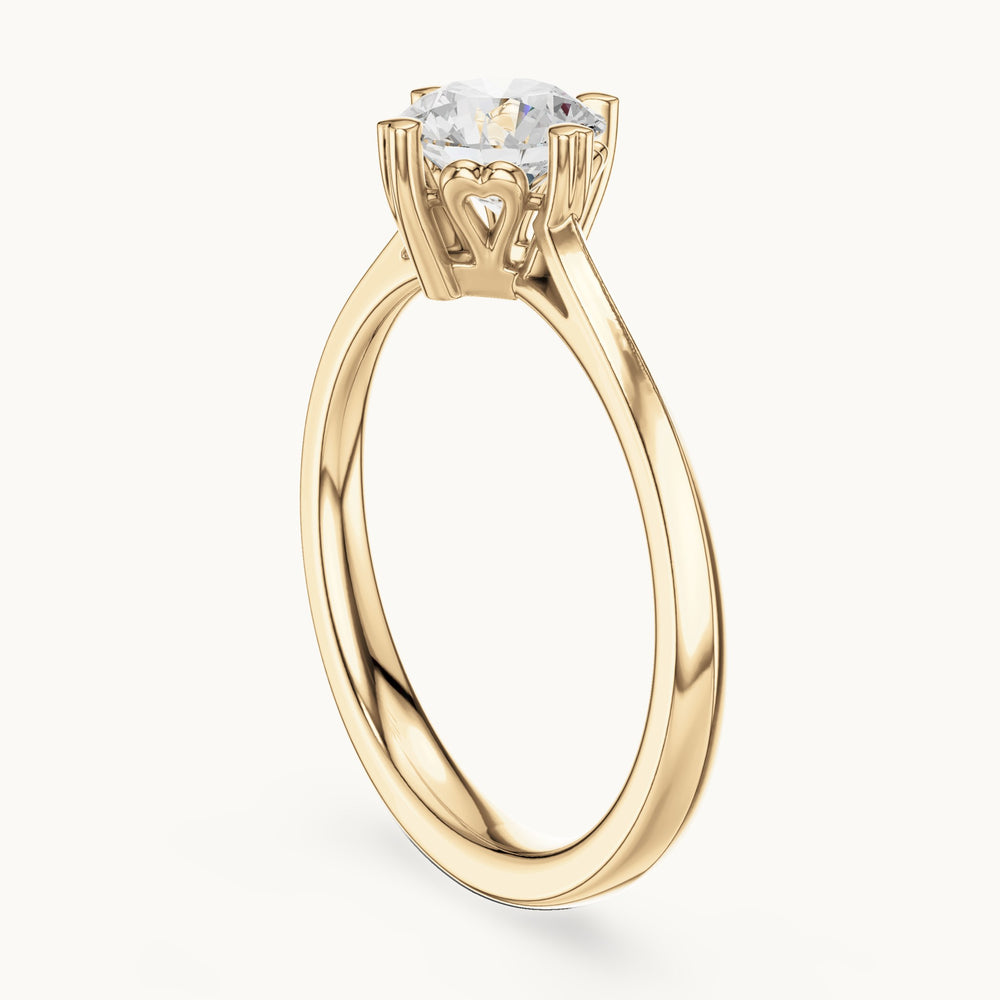 Round lab-grown diamond heart-gallery four-prong solitaire engagement ring in yellow gold, 0.85 CT TW, view 1