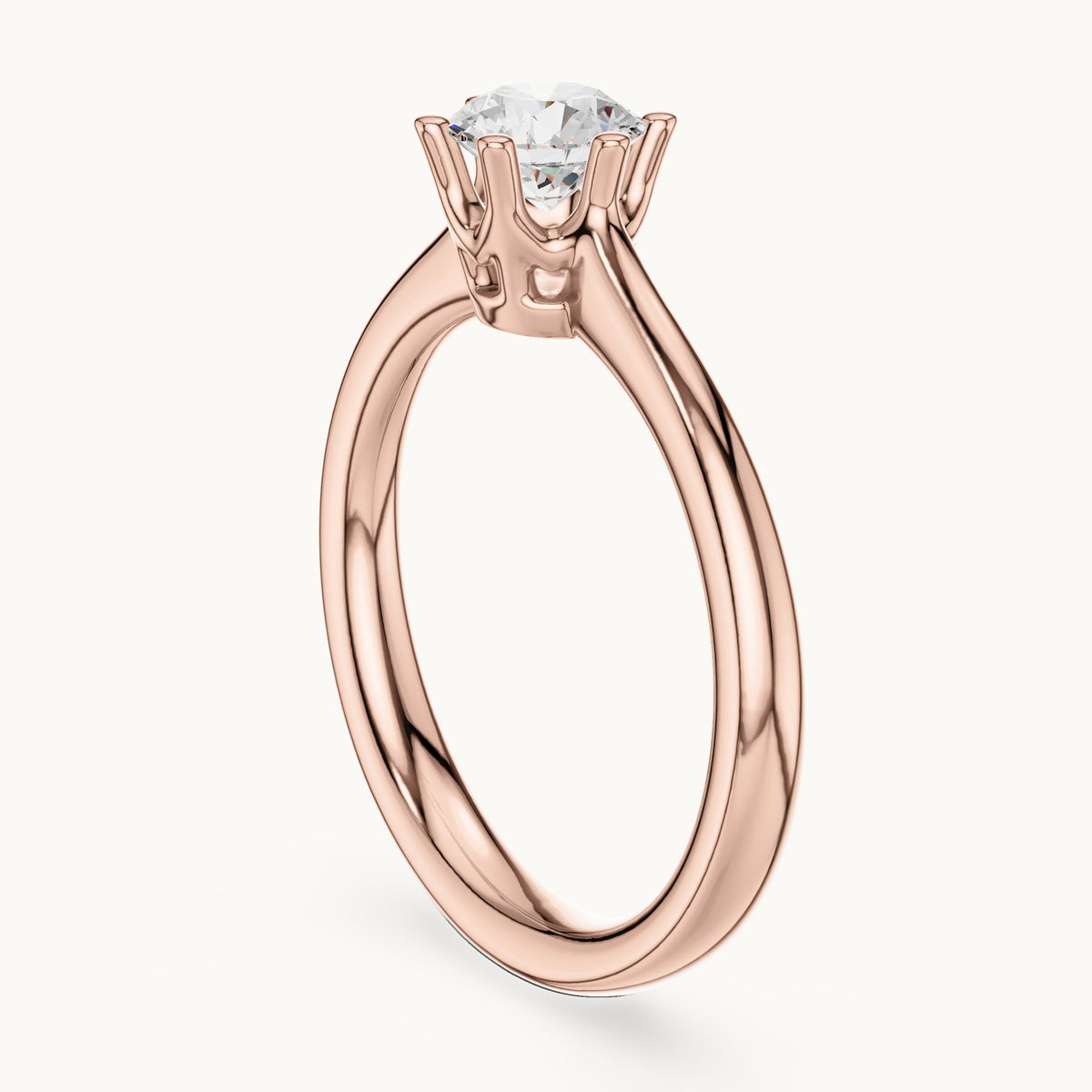 Round lab-grown diamond solitaire engagement ring in rose gold, 0.63 CT TW, view 1