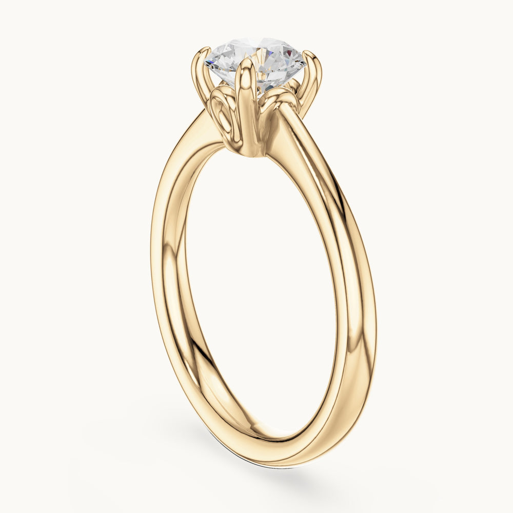 Round lab-grown diamond swirl-gallery four-prong solitaire engagement ring in yellow gold, 0.85 CT TW, view 1