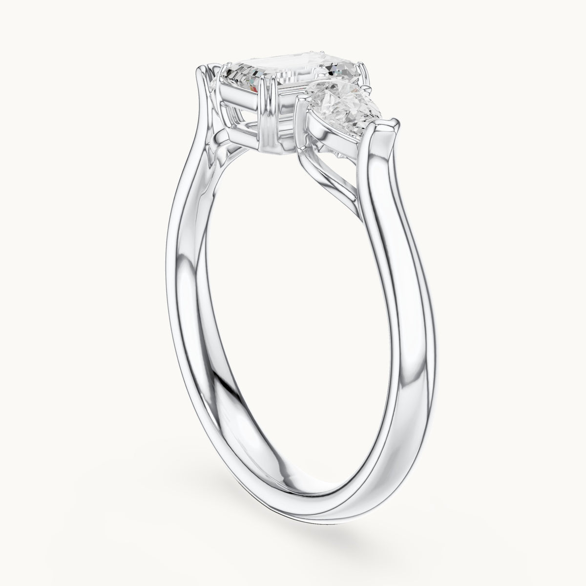 Emerald and pear lab-grown diamond three-stone engagement ring in white gold, 0.89 CT TW, view 1