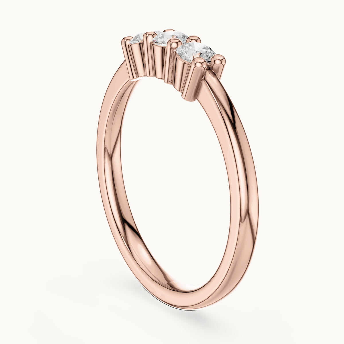 Round lab-grown diamond three-stone dainty ring in rose gold, 0.27 CT TW, view 1