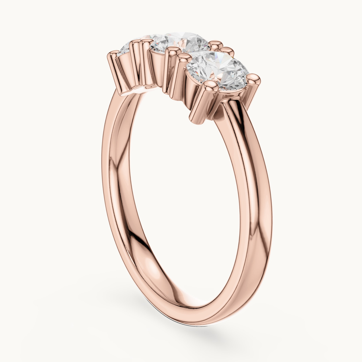 Round lab-grown diamond three stone ring in 14K rose gold, 0.99 CT TW, view 1