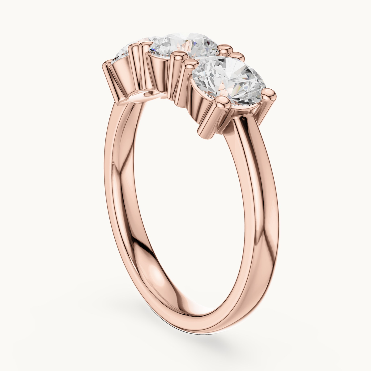 Round lab-grown diamond three stone ring in 14K rose gold, 1.50 CT TW, view 1